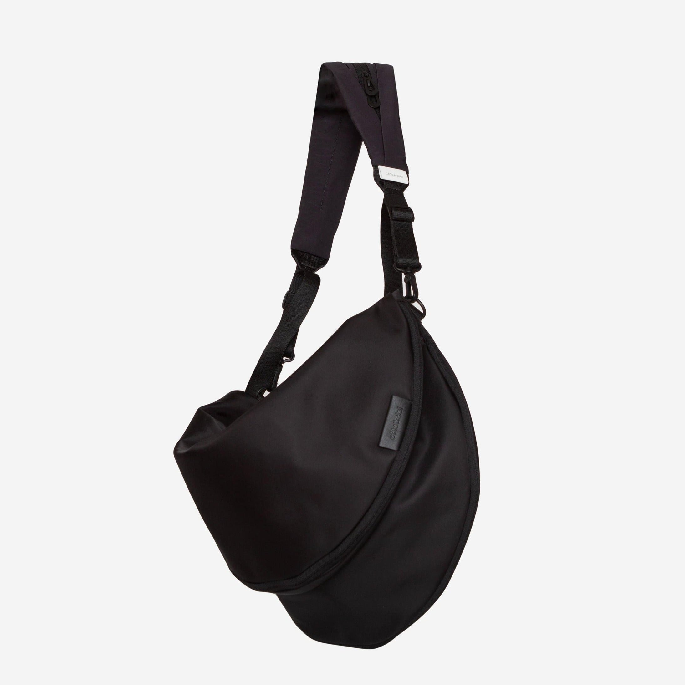 côte&ciel, Hala Sleek Black/Orange Sling Bag - cote&ciel