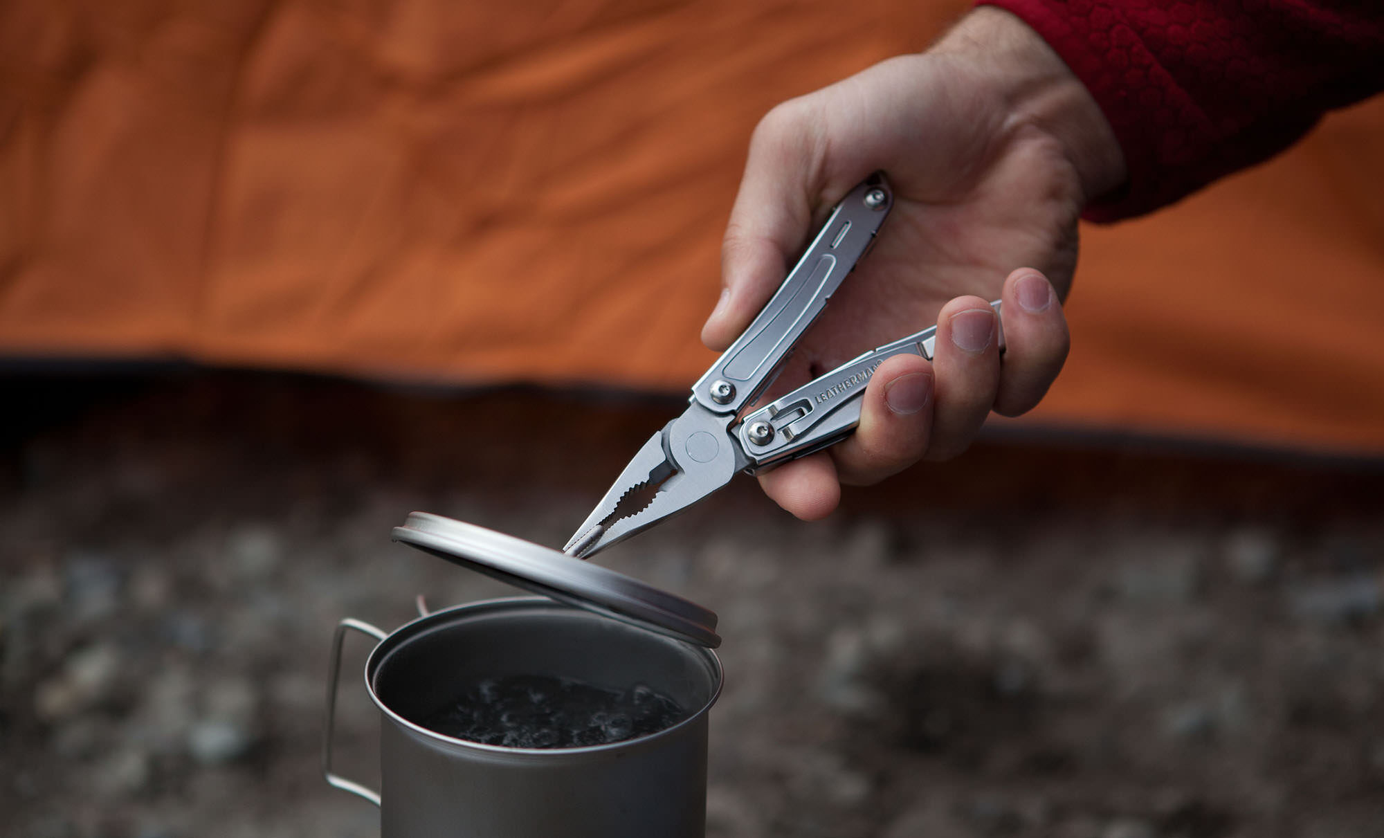 holding a cooking pot lid with a Sidekick